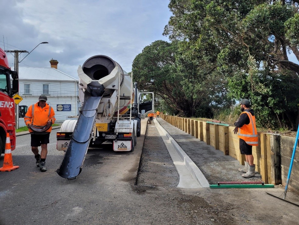 A group of men standing next to a concrete mixer

AI-generated content may be incorrect., Picture