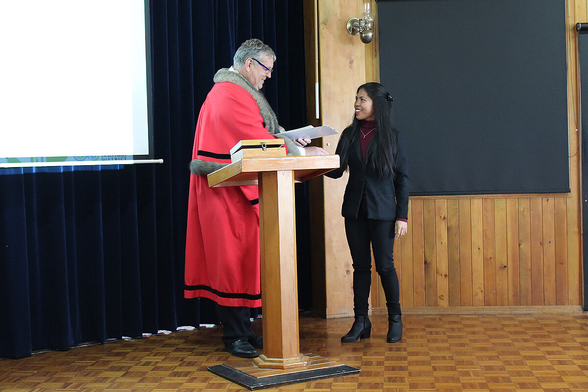 Ceremony concludes long journey for new citizens 